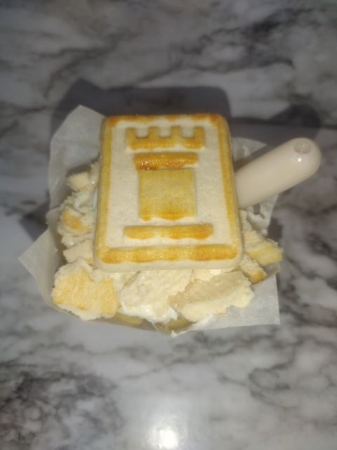 Banana Bliss cupcake with a wafer topper and pipette